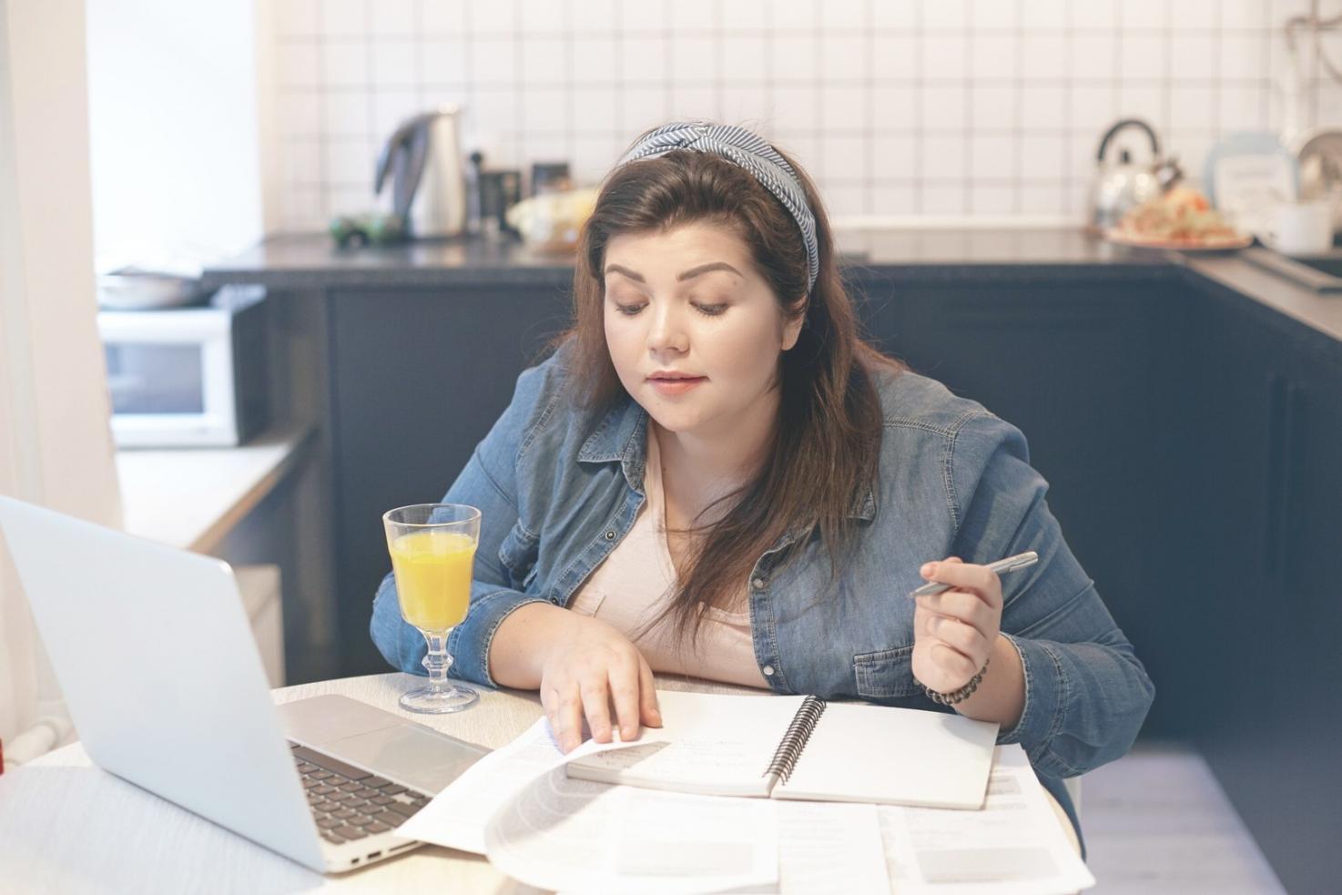 Professional workspace with financial documents and analysis tools